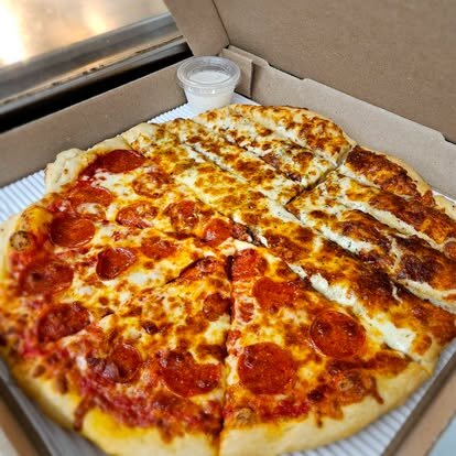 Half pepperoni pizza and half cheesy bread in a box