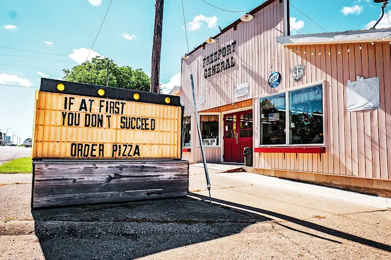 Heinz Freeport General sidewalk sign reading If at first you don't succeed, order pizza