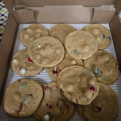 Box of fresh-baked M&M cookies